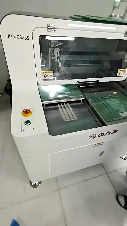 JLO-C325 marking and green panel on the JELIO machine shown in the routing video