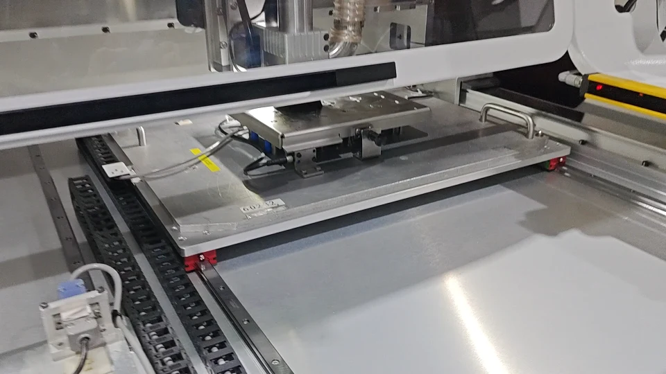Supported fixture beneath the spindle of the JELIO router product-page video
